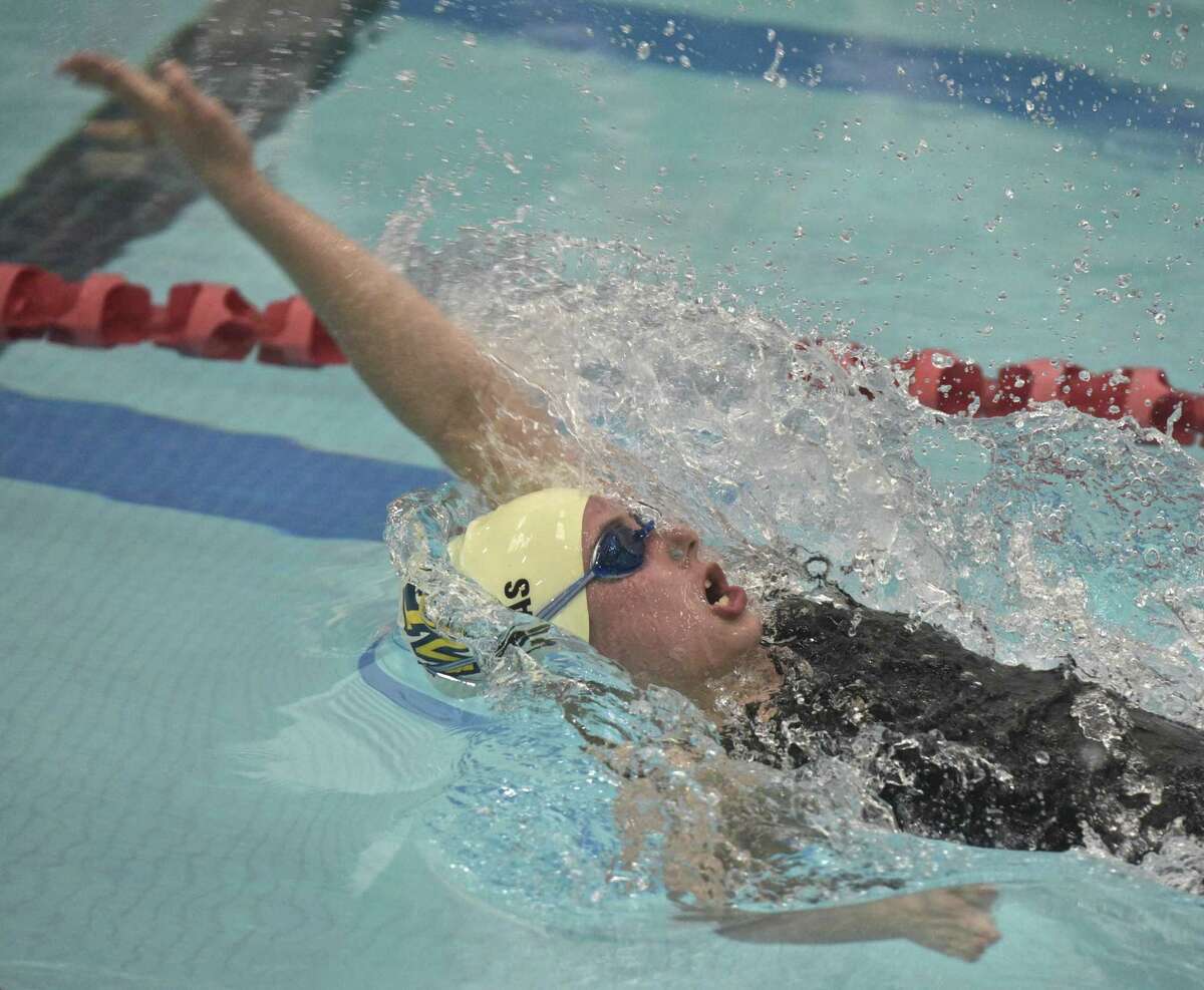 Weston’s Alexa Pappas swims the backstroke in the 200 yard medley relay during the girls SWC championships Saturday.