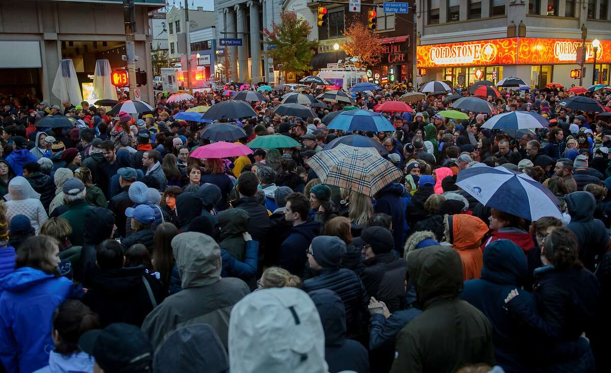 People gather for a interfaith candlelight vigil a few blocks away from the site of a mass shooting at the Tree of Life Synagogue on October 27, 2018 in Pittsburgh.