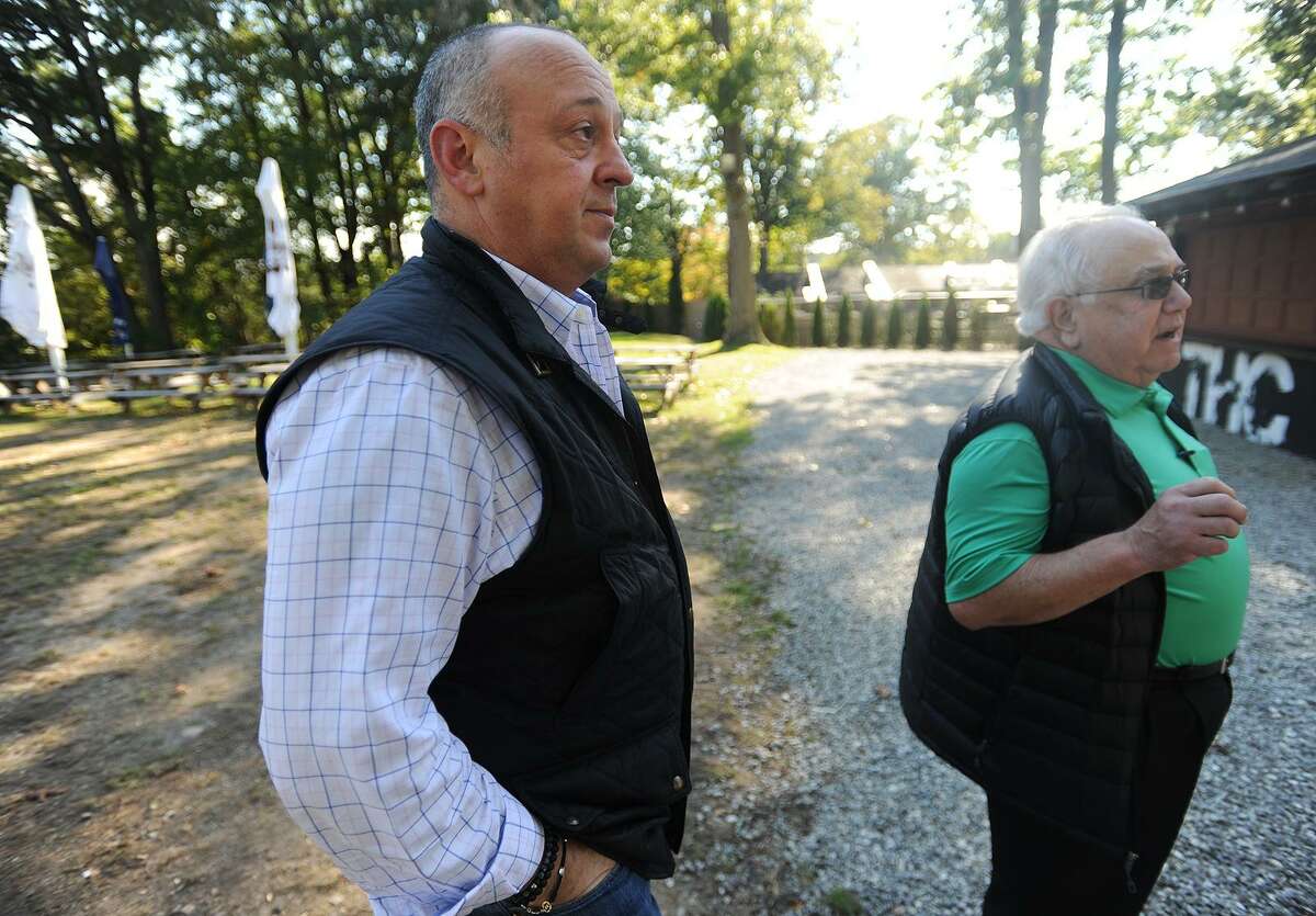 The Hops Company owner Umberto Morale, left, and his lawyer, Dominick Thomas, host a tour on Tuesday to illustrate proposed changes to the Derby business.