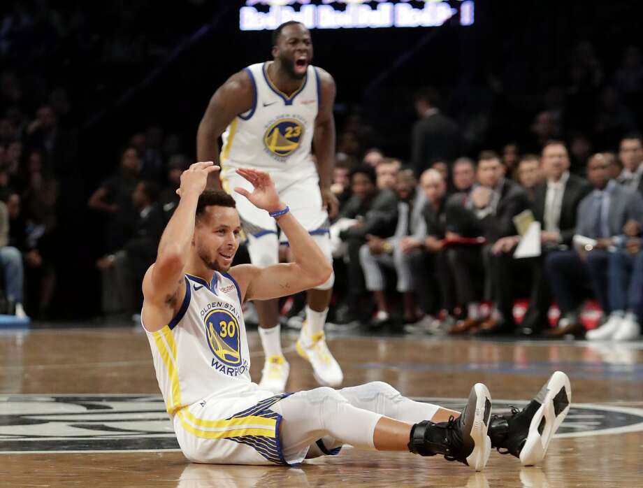 stephen curry and kevin durant power warriors to win over nets