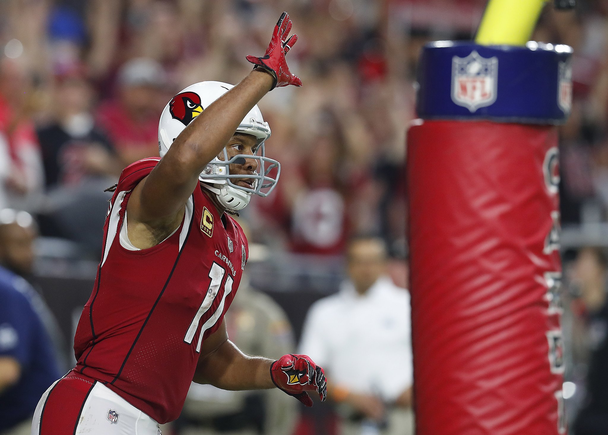 LARRY FITZGERALD AND SON TAKE IN A GAME