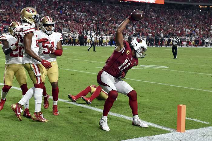 Seattle Seahawks' Richard Sherman, left, greets Arizona Cardinals' Larry  Fitzgerald after an NFL football game Sunday, Dec. 31, 2017, in Seattle.  Arizona won 26-24. (AP Photo/Elaine Thompson Stock Photo - Alamy