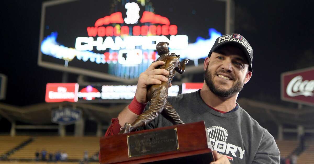 LOS ANGELES, CA - OCTOBER 28: Steve Pearce #25 of the Boston Red Sox is awarded the MVP after defeating the Los Angeles Dodgers 5-1 in Game Five of the 2018 World Series at Dodger Stadium on October 28, 2018 in Los Angeles, California. (Photo by Harry How/Getty Images)