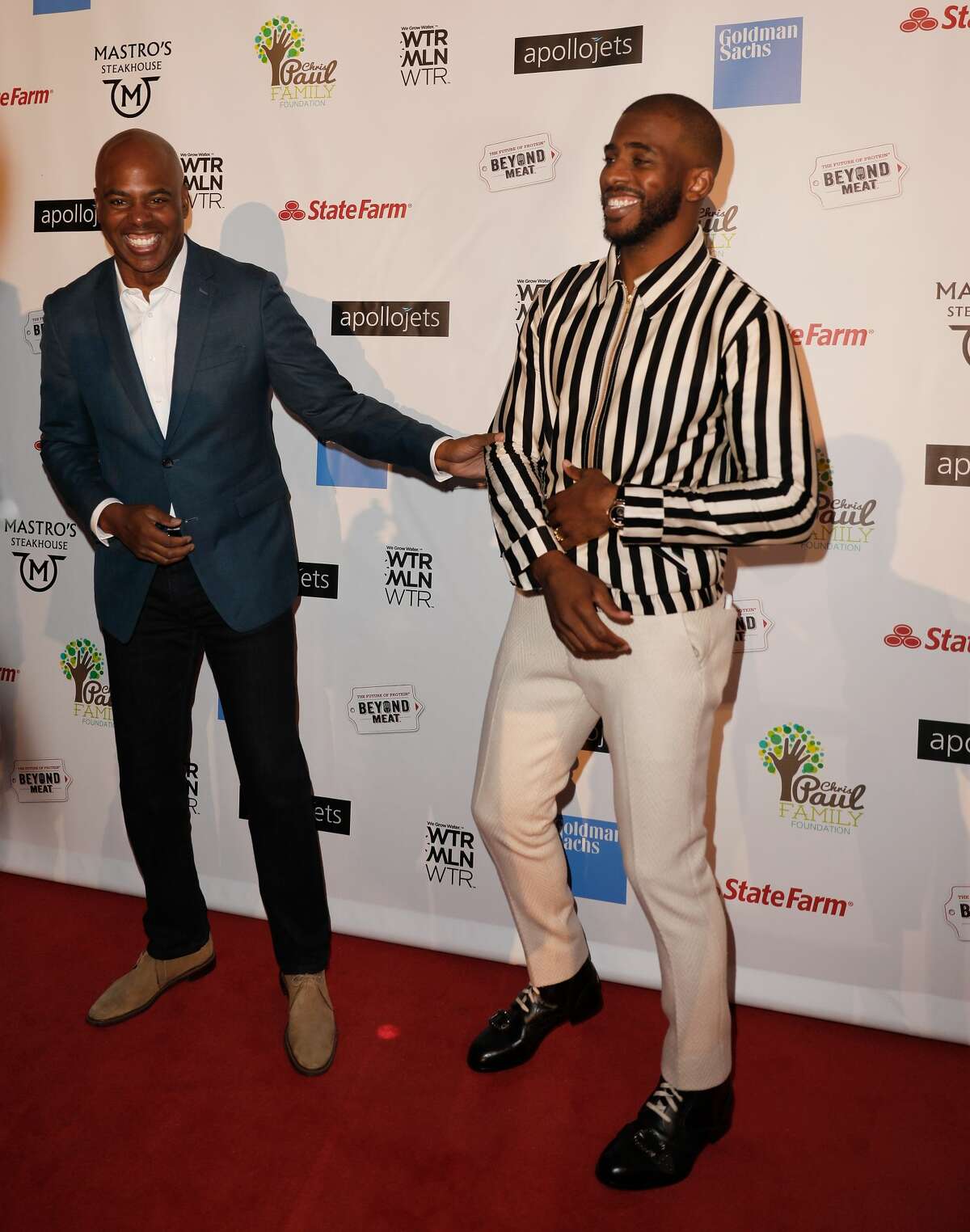 HOUSTON, TX - OCTOBER 28: Kevin Frazier and Chris Paul at the Chris Paul Family Foundation's "Celebrity Server" Fundraiser at Mastro's Steakhouse on October 28, 2018 in Houston, Texas. (Photo by Bob Levey/Getty Images)