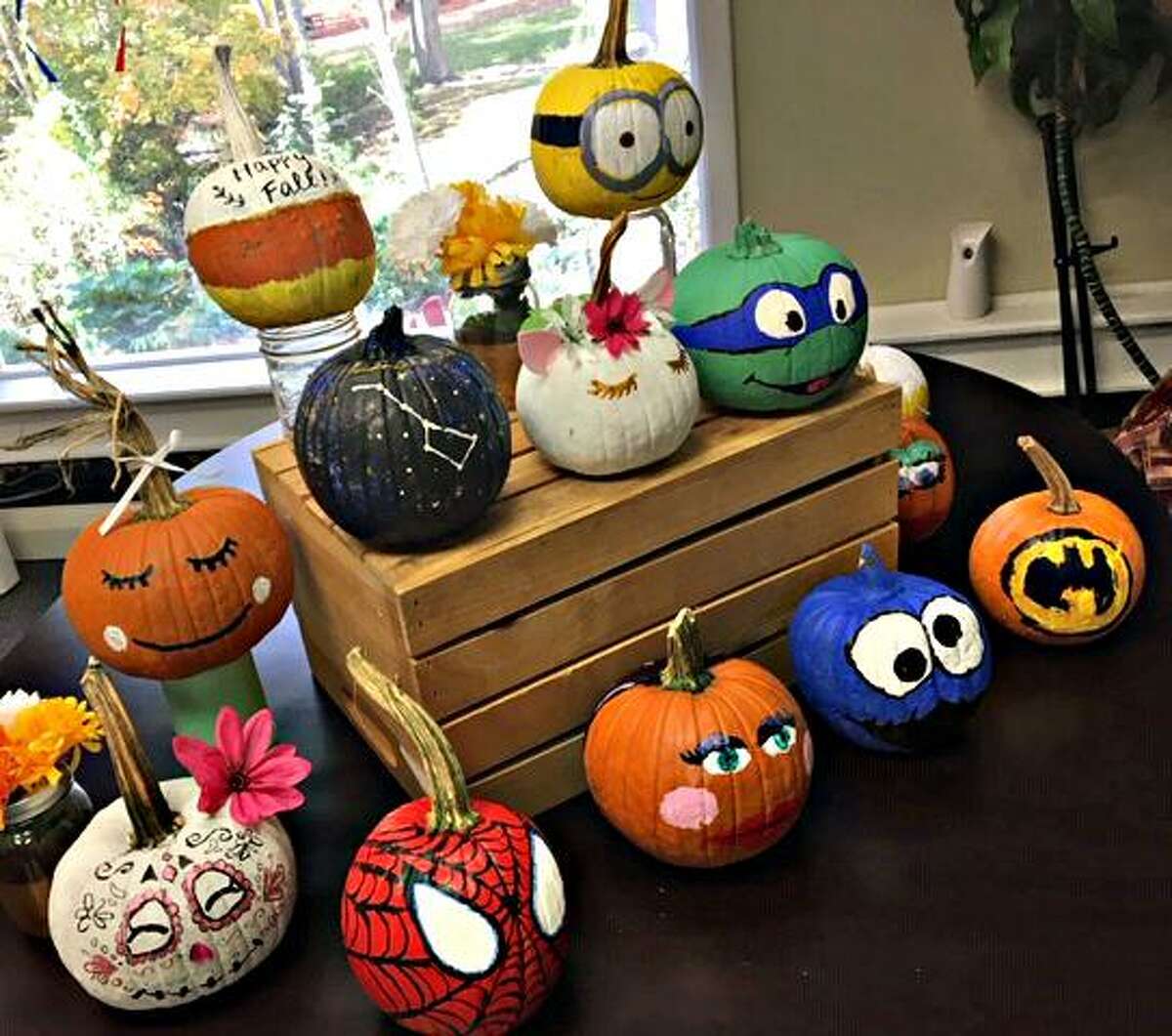 Middletown’s Change Inc. volunteers paint pumpkins for sick kids at CCMC