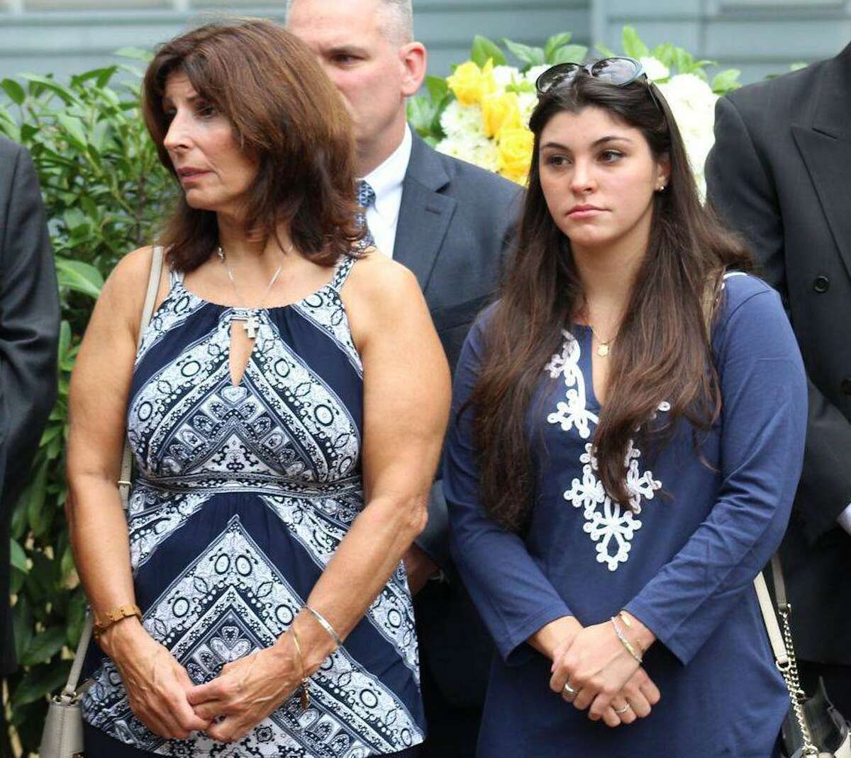 FILE: Roseanne Nelson (left) and her daughter Caitlin Nelson (right) at a 2016 9/11 ceremony held to honor her father, James A. Nelson, who was killed in the 2001 terrorist attack when Caitlin was 5-years-old. Caitlin Nelson, 21, of Clark, NJ, died Sunday, April 2, 2017 from complications following a campus event.