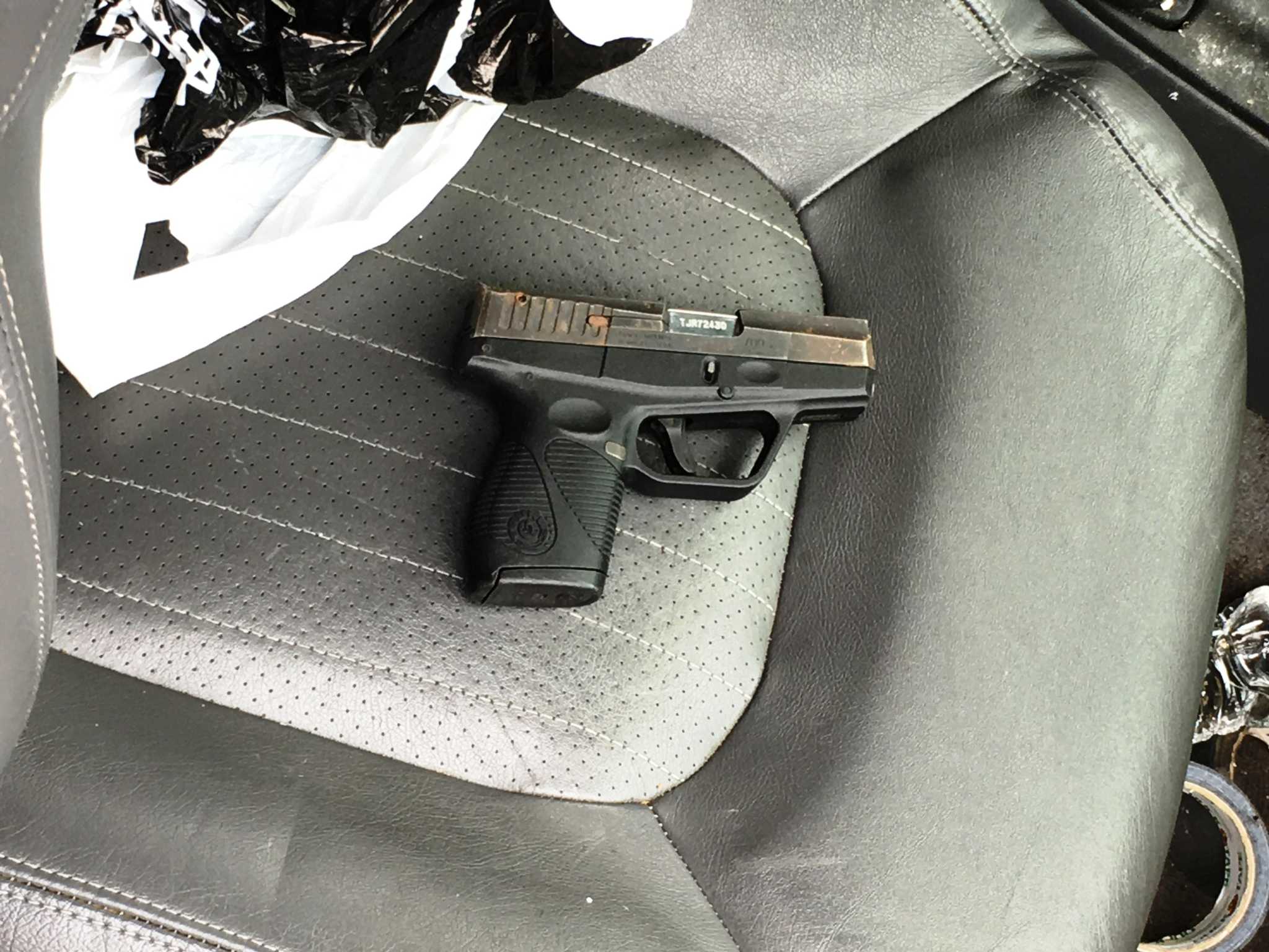 Stamford felon charged with stashing stolen gun in parked car
