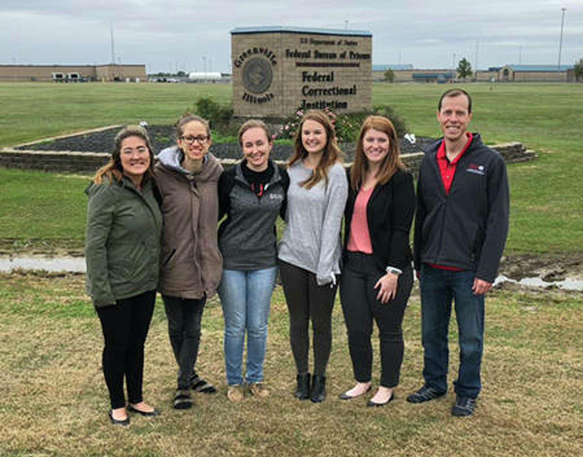SIUE students visiting the Federal Corrections Institution in Greenville (L-R) Alex Mena, Erin Ryan, Kaitlin Henning, Lizzy Sakran, Amanda Raymond and Megan Mosley (not pictured). They stand alongside School of Education, Health and Human Behavior Interim Dean Paul Rose.