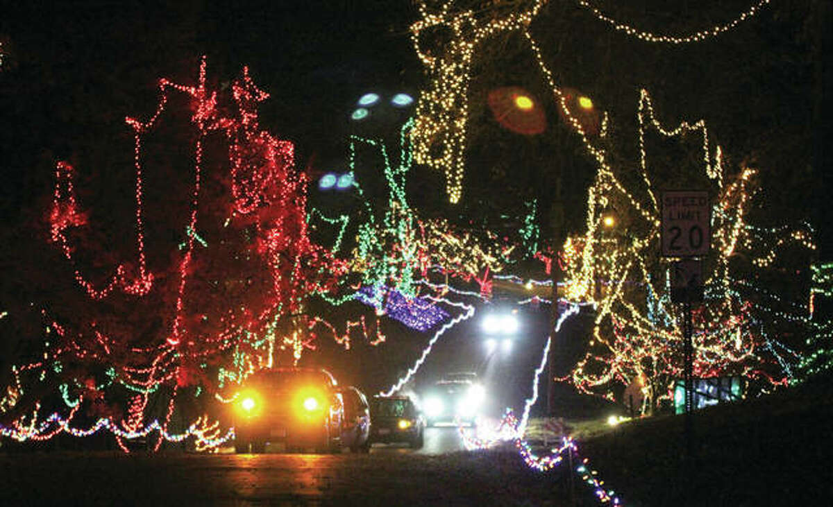 In this file photo from 2016, a line of cars makes its way toward the exit of Christmas Wonderland in Rock Spring Park. The annual light display is in danger of not going on this year after roughly 2,000 feet of copper wire was stolen from the park last week.