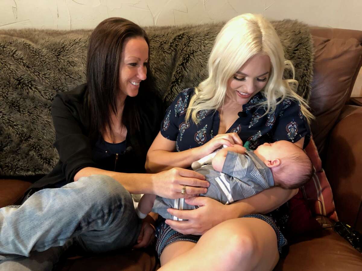 Ashleigh Coulter, 28, and Bliss Coulter, 36, of north Texas are the proud new mothers of a boy named Stetson and using a method known as "effortless reciprocal in vitro fertilization," they both carried their own baby.