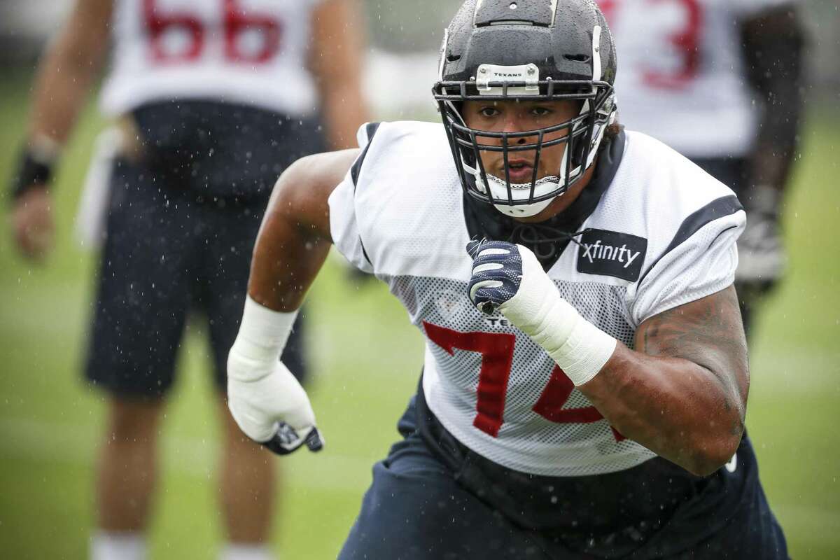 Houston Texans offensive tackle Kendall Lamm runs off the line during training camp at the Greenbrier Sports Performance Center on Friday, Aug. 3, 2018, in White Sulphur Springs, W.Va.