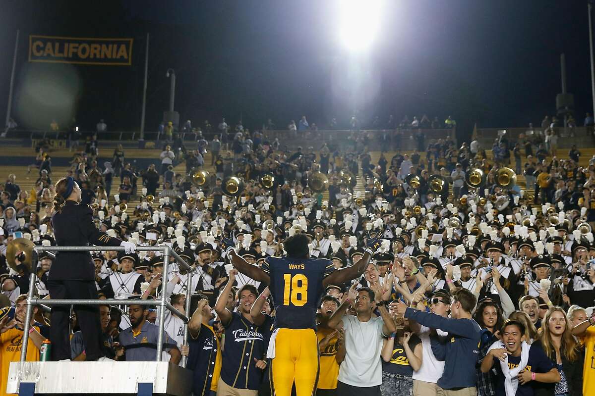 BERKELEY, CA - OCTOBER 27: Maurice Ways #18 of the California Golden Bears conducts the band after defeating the Washington Huskies at California Memorial Stadium on October 27, 2018 in Berkeley, California. (Photo by Lachlan Cunningham/Getty Images)