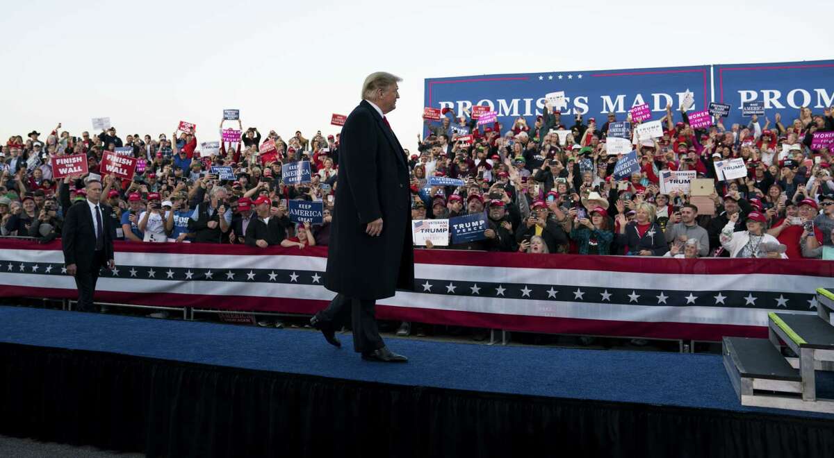 President Donald Trump is shown on stage during a campaign rally Saturday in Murphysboro, Ill. Trump said he was preparing an executive order to end birthright citizenship in the U.S., his latest attention-grabbing maneuver days before midterm congressional elections.