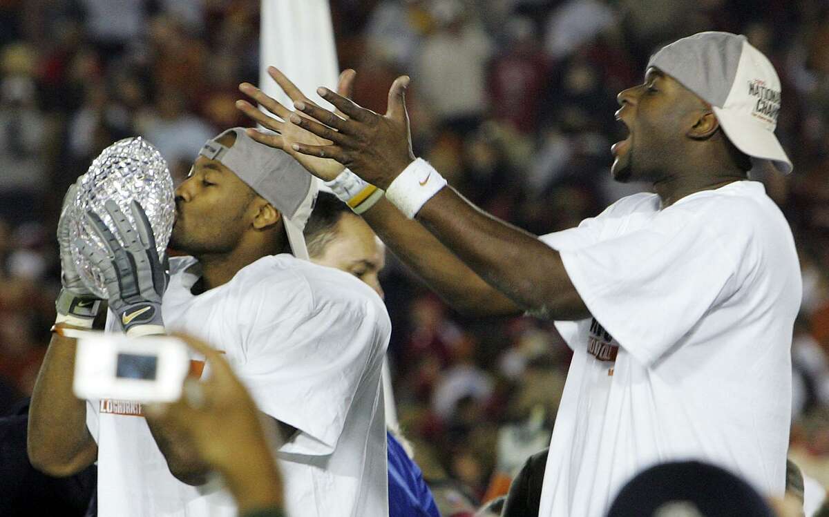 After winning the national title with Vince Young, right, Michael Huff had an All-Pro career with eight NFL seasons.