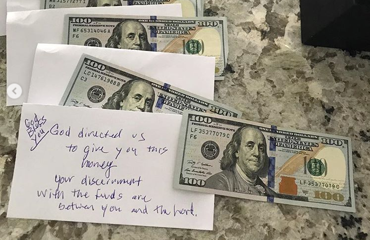 Random Bill Person Mystery group handing out $100 bills to random people in Sacramento area
