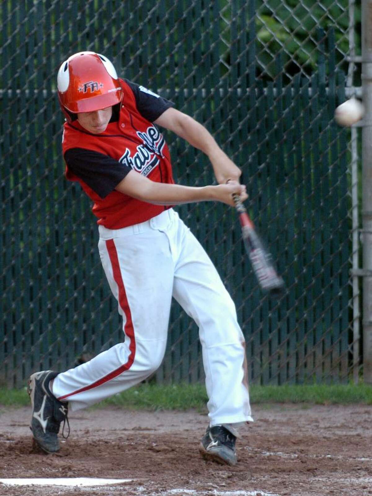Fairfield American's Nick Nardone gets a hit during the District 2 little league tournament game against Monroe Thursday July 15, 2010 at Blackham School field in Bridgeport.