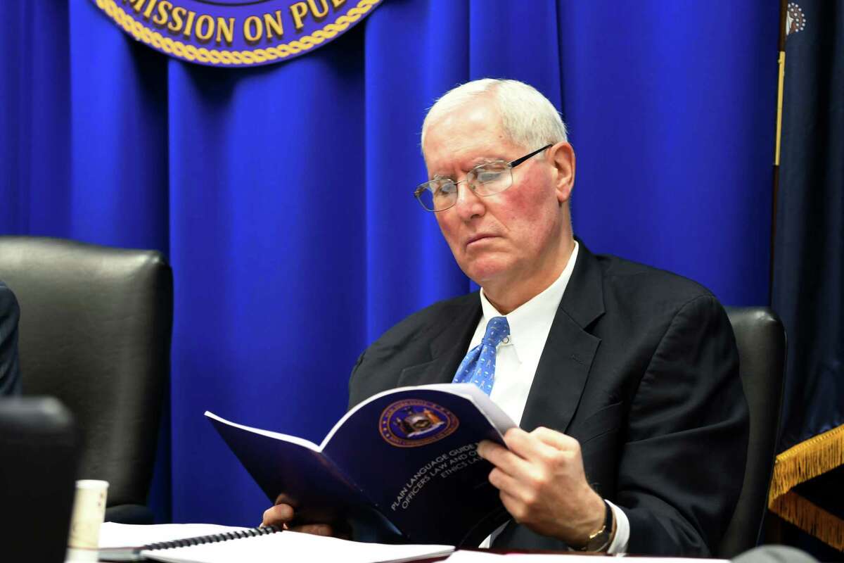 Gary Lavine, a commissioner on the Joint Commission of Public Ethics, reads the agenda during a JCOPE meeting on Tuesday, Oct. 30, 2018, in Albany, N.Y. (Will Waldron/Times Union)