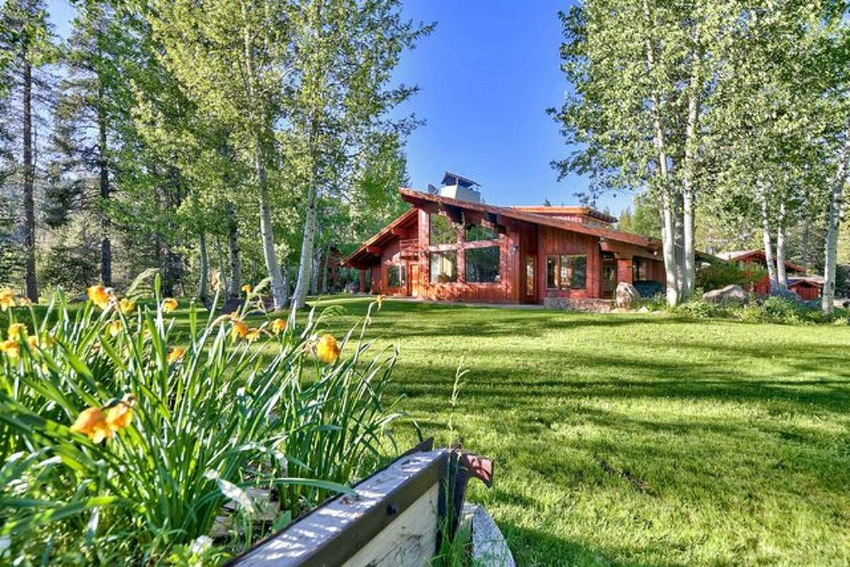 The hand-crafted estate of Squaw Valley Founders, Wayne and Sandy Poulsen sits on nearly 30 acres of aspen and pine groves. It's listed for $15 million with Valerie Forte of Engel & Völkers Truckee.
