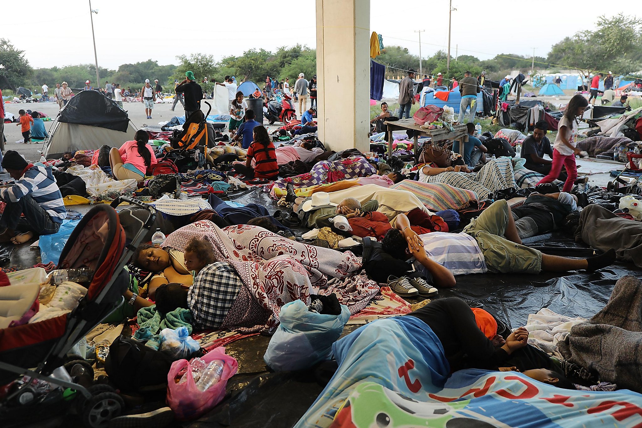 Why do refugees caravan to the U.S. border? Because they are fleeing