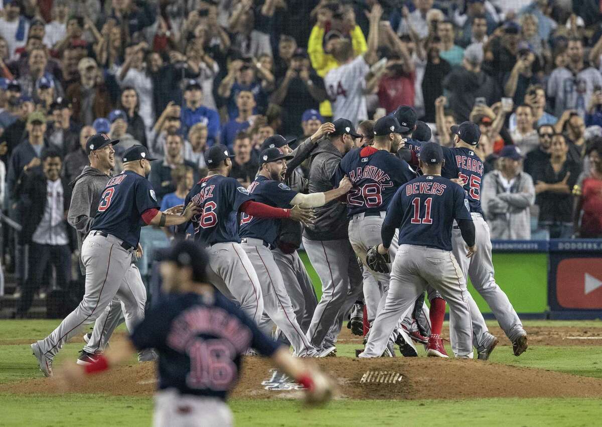 The Boston Red Sox celebrate a 5-1 win over the Los Angeles Dodgers to win the World Series on Sunday, Oct. 28, 2018 at Dodger Stadium in Los Angeles, Calif. (Gina Ferazzi/Los Angeles Times/TNS)