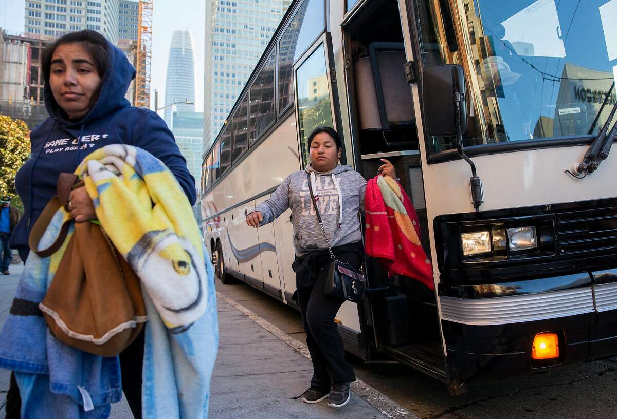 Marriott workers from Salinas, Calif. who wished not to be identified are dropped off by a shuttle bus to work at the Marriott Marquis in San Francisco, Calif. Tuesday, Oct. 30, 2018 as daily Marquis workers continue to strike.