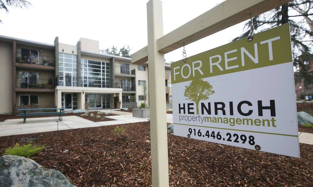 A "For Rent" sign is posted outside an apartment building in Sacramento on Jan. 8, 2018.