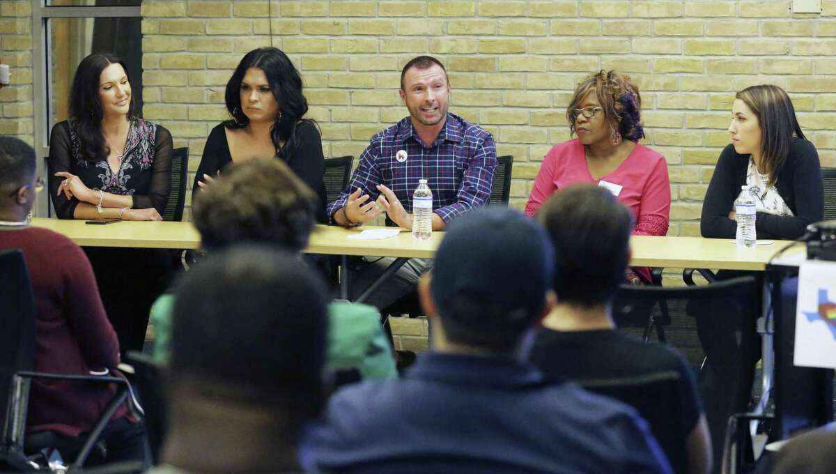 A panel answers questions during a town hall Oct. 30, 2018, at the Carver Library about a study of resiliency in the LGBTQ community in San Antonio. From left are Jamie Zapata, Luka Rios, Greg Casillas, the Rev. Naomi Brown and Kimberly Berry.