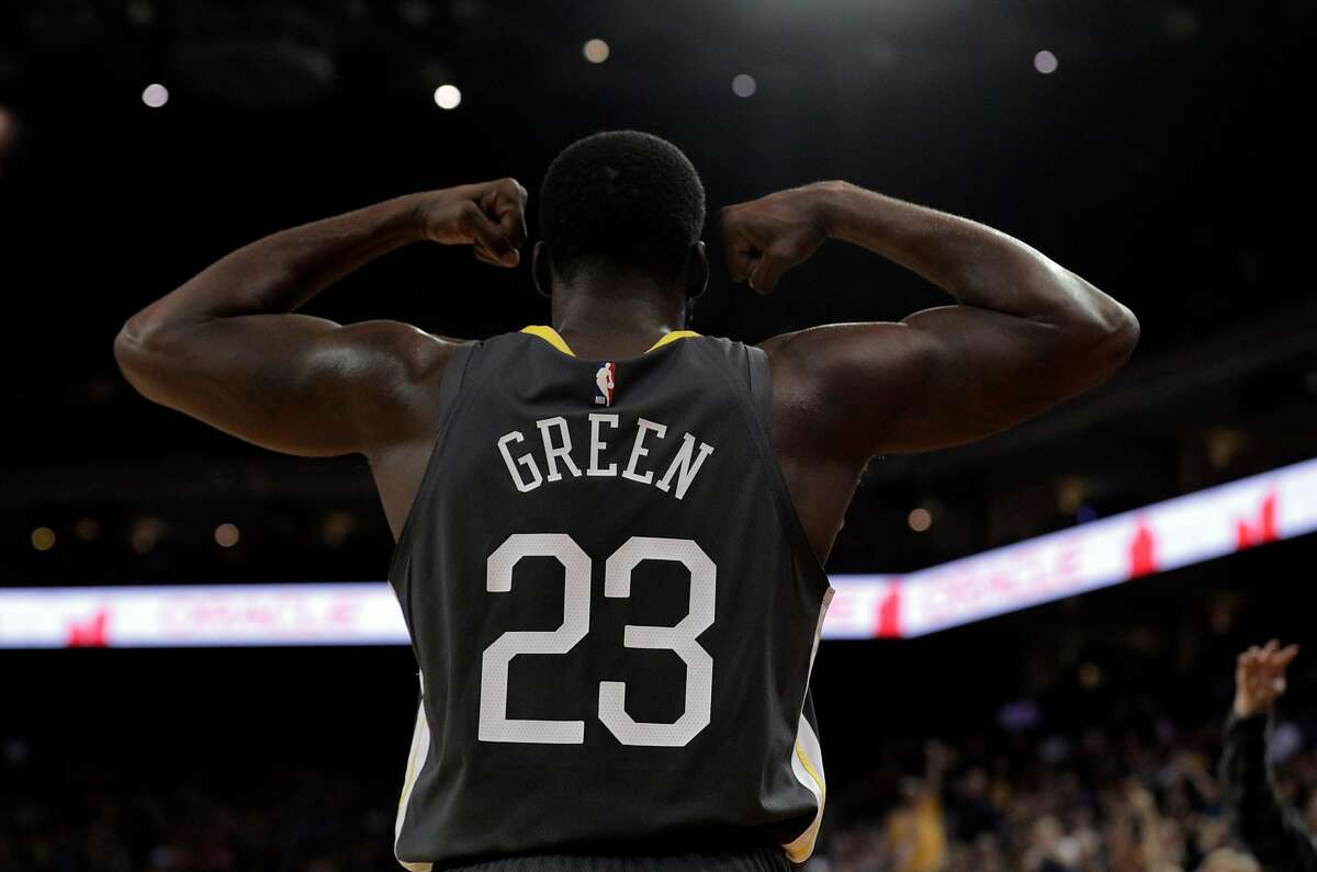 Draymond Green gives football a shot, but will stick with Michigan