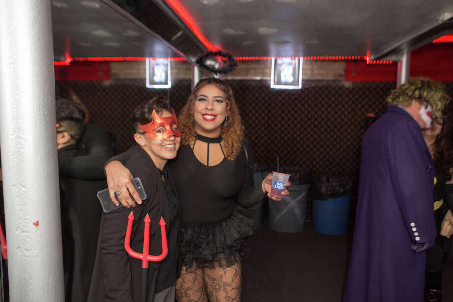 Photos S.A. Halloween partygoers take over downtown San