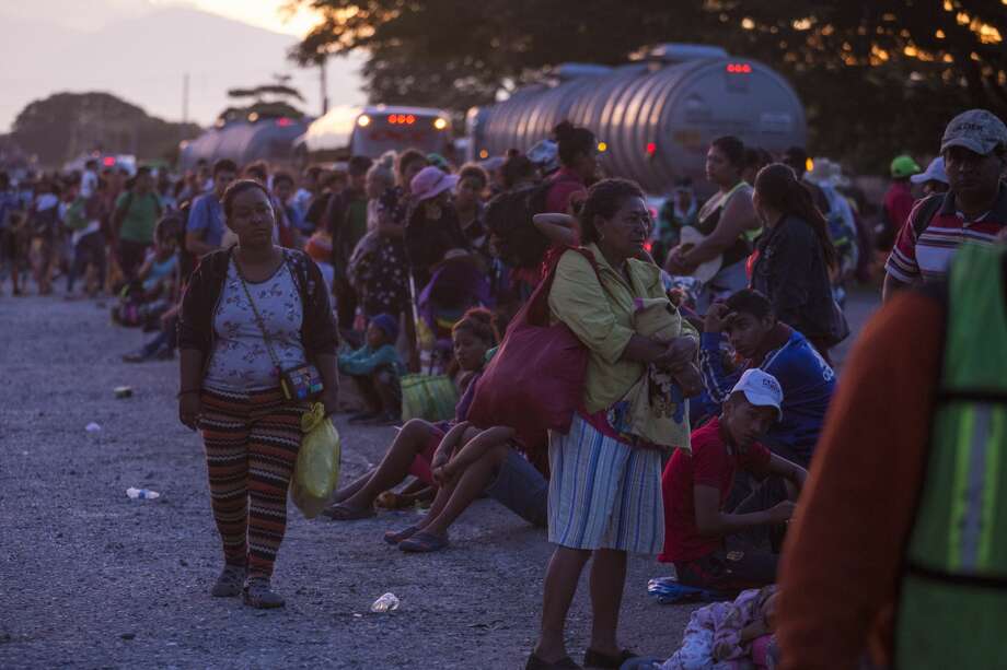 Wiping out borders: Not everyone is going to just sit around in their climate-ravaged towns hoping for (more or less) rain. Think migration is controversial now! Check out what Scientific American reported Oct. 29: The controversial caravan of Central Americans "traveling to the southern U.S. border is a preview of what the United States and other rich countries can expect as global warming compounds pressures on fragile and poor states, according to security and immigration experts.
"Experts caution against simple explanations for the caravan—political instability, violence and economic scarcity are all factors—but say that climate change promises to make such mass migrations more common in the coming years."
Photo: Hundreds of Central American migrants wait for an empty truck to be transported to the next destination of the caravan on Oct. 30, 2018 in Niltepec, Mexico Photo: Cristopher Rogel Blanquet/Getty Images