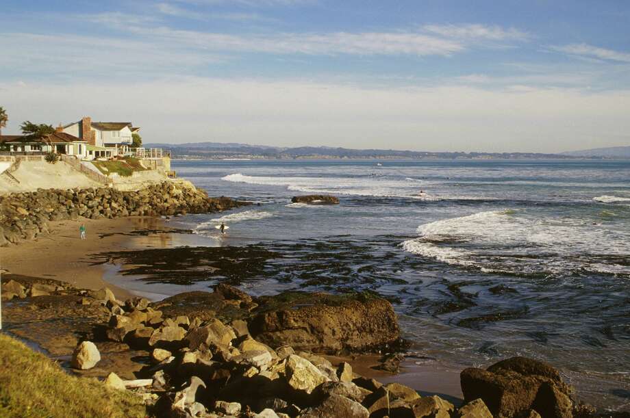 Island are in trouble, sure, makes sense. So, are coastal towns and cites. For instance, as The Guardian put it earlier this month, "Sinking Santa Cruz: climate change threatens famed California beach town."
The city of Santa Cruz summarized in its newest climate adaption plan: "Between 2060 and 2100, increased coastal wave damage, greater flooding depths and frequency and higher tides will threaten significant portions of current beach front properties and low lying areas, and will degrade the local beach community charm that currently exists. Protection and/or relocation of buildings and infrastructure from these risks will be costly, technically challenging." Photo: Education Images/UIG Via Getty Images