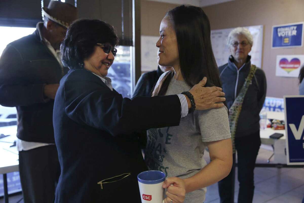 Democratic candidate for Texas 23rd congressional district Gina Ortiz Jones, right, greets Democratic candidate for Texas governor Lupe Valdez, at Jones’ headquarters on Wurzbach Road, Thursday, November 1, 2018. The two met with supporters and volunteers for a rally before block walking.