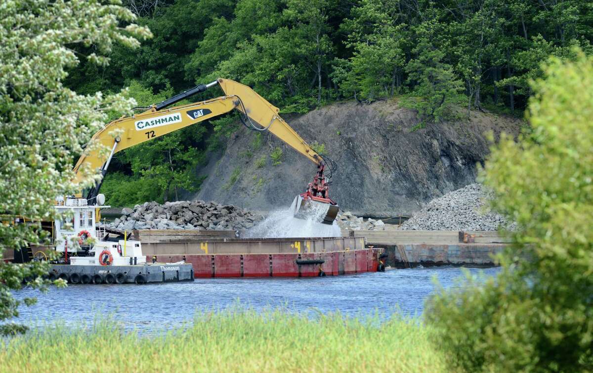 Work on General Electric?’s ongoing PCB remediation in the upper Hudson River continues near Lock 2 just south of Mechanicville Thursday afternoon, Aug. 20, 2015, in Halfmoon, N.Y. GE said it has cost more than $1 billion to field a flotilla of dredges and barges as well as build the treatment plant. Between 1947 and 1977, GE dumped 1.3 million pounds of PCBs into the Hudson from capacitor plants in Hudson Falls and Fort Edward. (Will Waldron/Times Union)