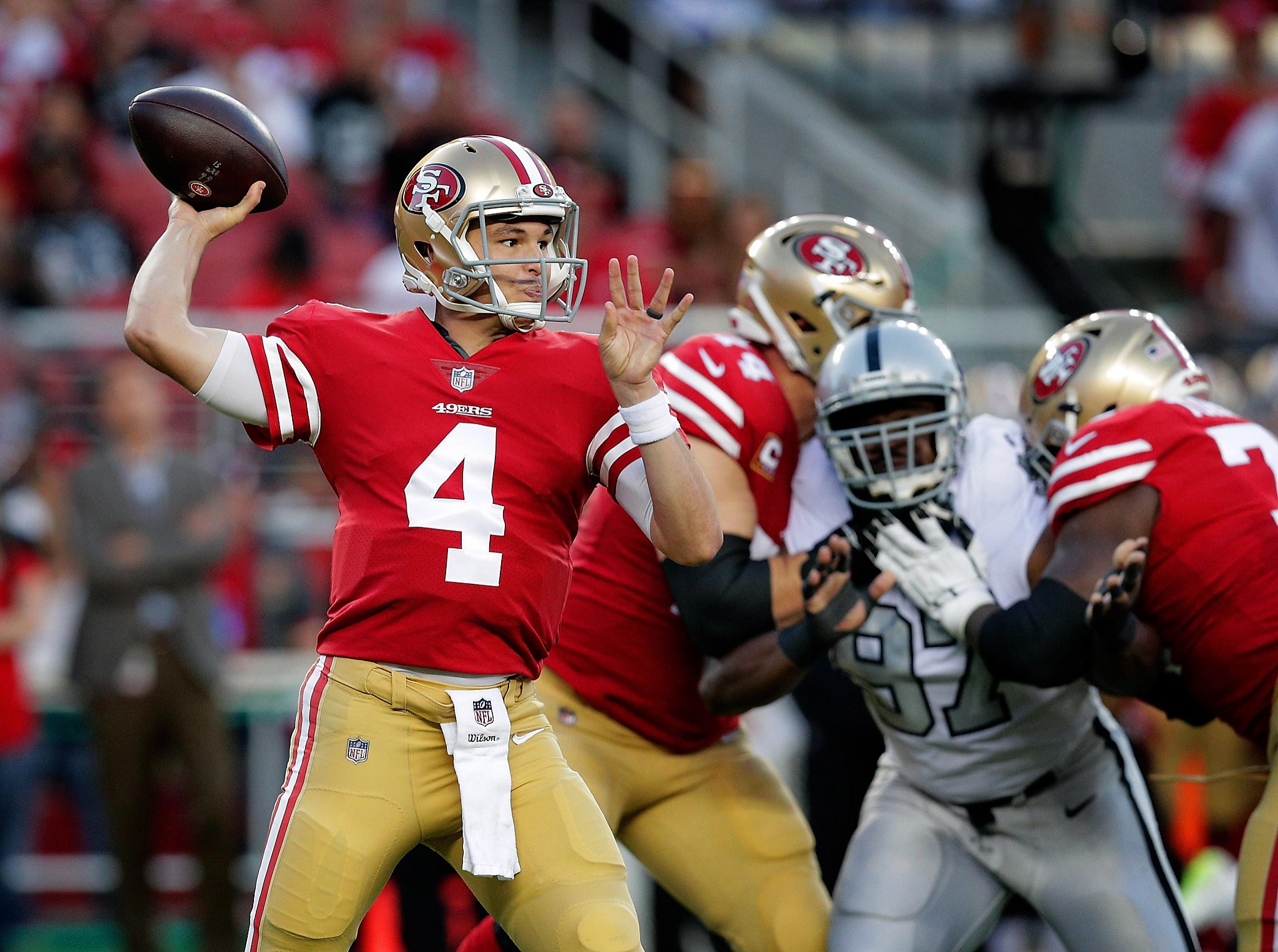 Cassius Marsh of the San Francisco 49ers celebrates after sacking