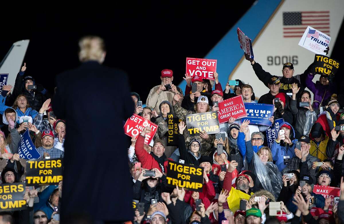 US President Donald Trump faces supporters during a campaign rally at Columbia Regional Airport in Columbia, Missouri, November 1, 2018. (Photo by SAUL LOEB / AFP)SAUL LOEB/AFP/Getty Images