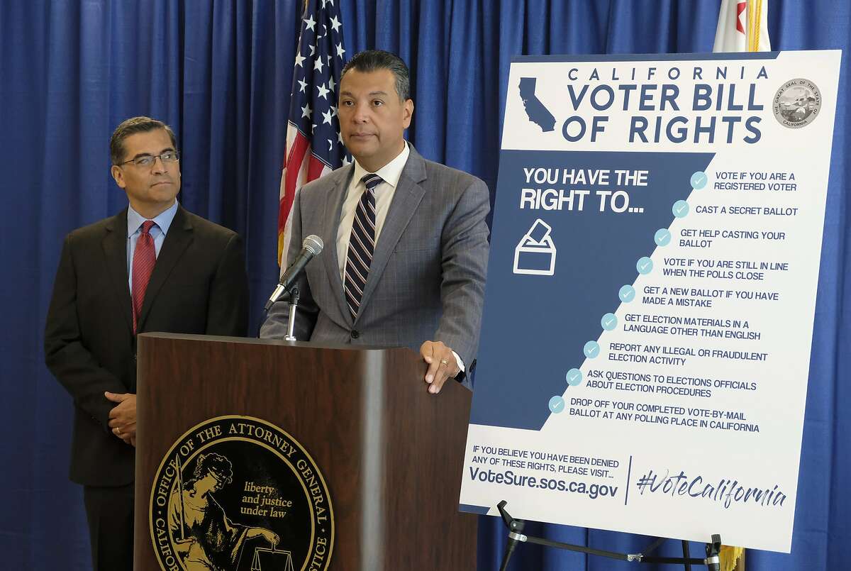 California Secretary of State Alex Padilla, right, and Attorney General Xavier Becerra, left, hold a news conference to discuss voting rights and announce new voter registration numbers Friday, Nov. 2, 2018, in San Francisco. (AP Photo/Eric Risberg)