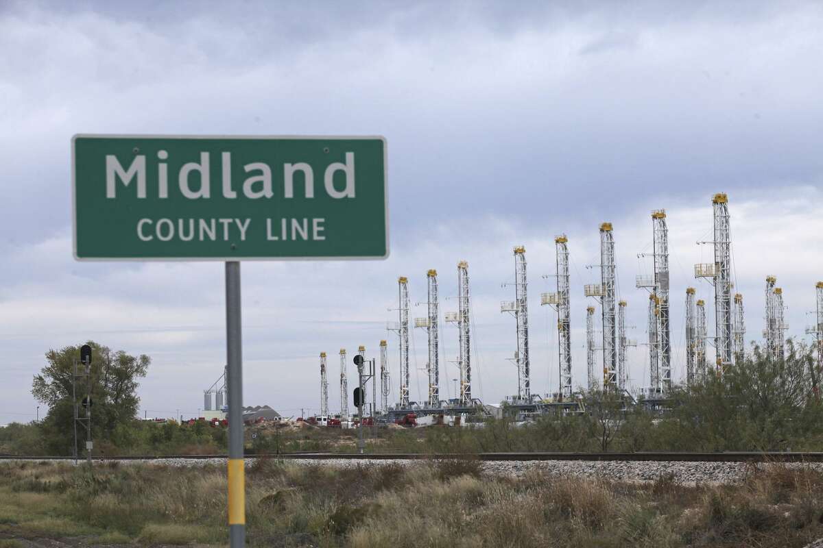 Numerous oil rigs stand idle at the Midland County Line Thursday, Nov. 17, 2016, in Midland, Texas. The U.S. Geological Survey has determined that the vast shale field in West Texas could yield 20 billion barrels of oil, making it the largest source of shale oil the agency has ever assessed. The agency said in a release Nov. 15 that the Wolfcamp Shale geologic formation in the Midland area also contains an estimated 16 trillion cubic feet of natural gas. (Jacob Ford/Odessa American via AP)