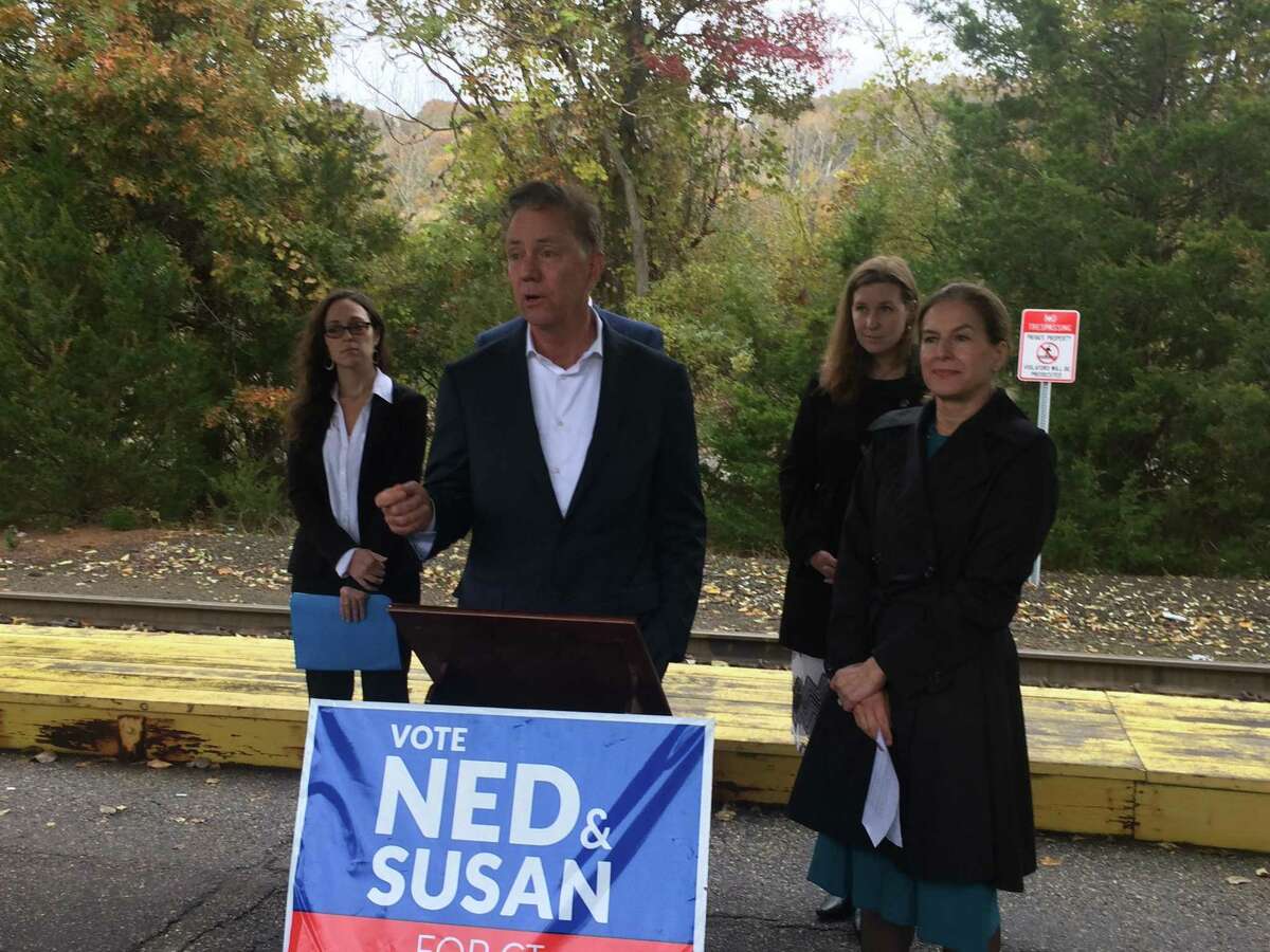 Ned Lamont, the Democratic gubernatorial candidate, promises $14 million in state bonding for a Valley Firefighter Training Center in Beacon Falls during a stop at the Derby train station Nov. 2, 2018. To his right is Susan Bysiewicz, his running mate. Behind him are Kara Rochelle, a candidate for the vacant 104th State House seat and Mary Welander, a candidate for the 114th State House seat