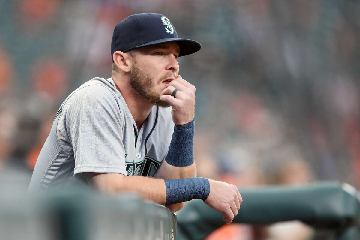 BALTIMORE, MD - JUNE 26: Chris Herrmann #26 of the Seattle Mariners looks on from the dug out during a baseball game against the Baltimore Orioles at Oriole Park at Camden Yards on June 26, 2018 in Baltimore, Maryland. The Mariners won 3-2. (Photo by Mitchell Layton/Getty Images)