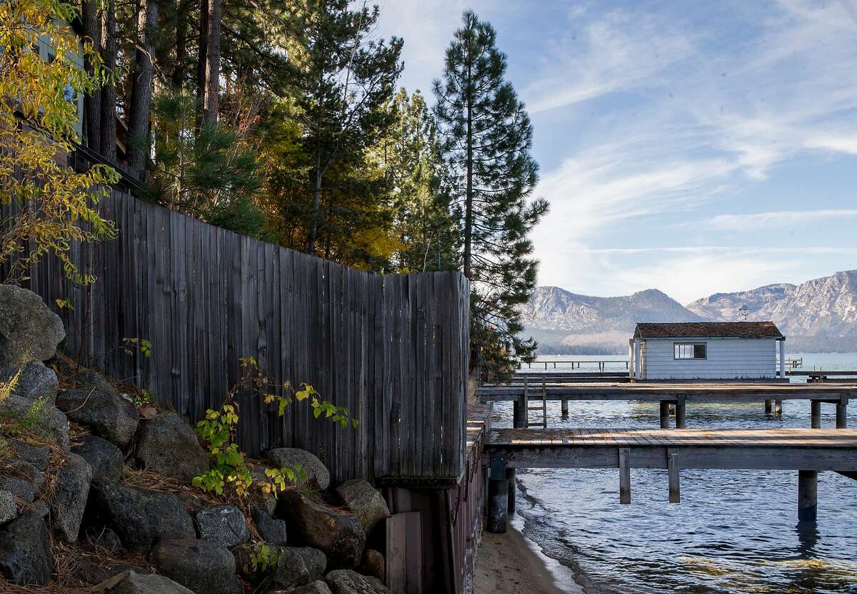 Private docks owned by waterfront rental properties are seen along the shore of Lake Tahoe in South Lake Tahoe, Calif. Friday, Nov. 2, 2018.