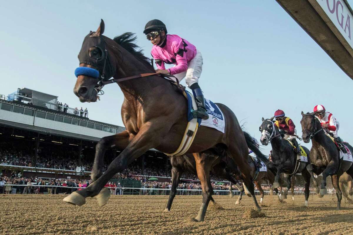 West Coast ridden by jockey Mike Smith lead wire to wire on the way to the win in the 148th running of The Travers Stakes at the Saratoga Race Course in Saratoga Springs, N.Y. (Skip Dickstein/Times Union)
