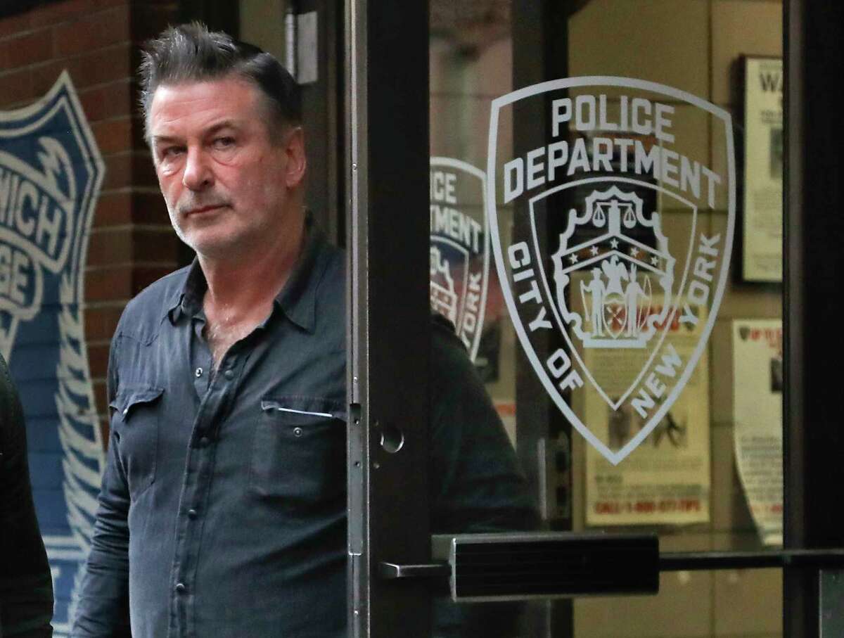 Actor Alec Baldwin walks out of the New York Police Department's 10th Precinct, Friday, Nov. 2, 2018, in New York. Baldwin was arrested Friday after allegedly punching a man in the face during a dispute over a parking spot outside his New York City home, authorities said.(Photo/Julie Jacobson)