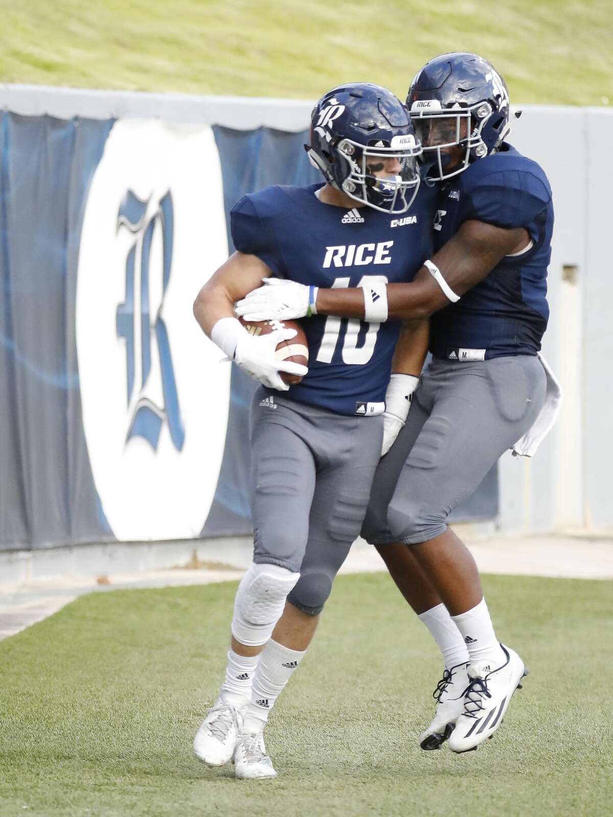 Rice Owls wide receiver Austin Trammell (10) his touchdown with running back Aston Walter (1) during the fourth quarter of a college football game at Rice Stadium, Saturday, Nov. 3, 2018, in Houston.