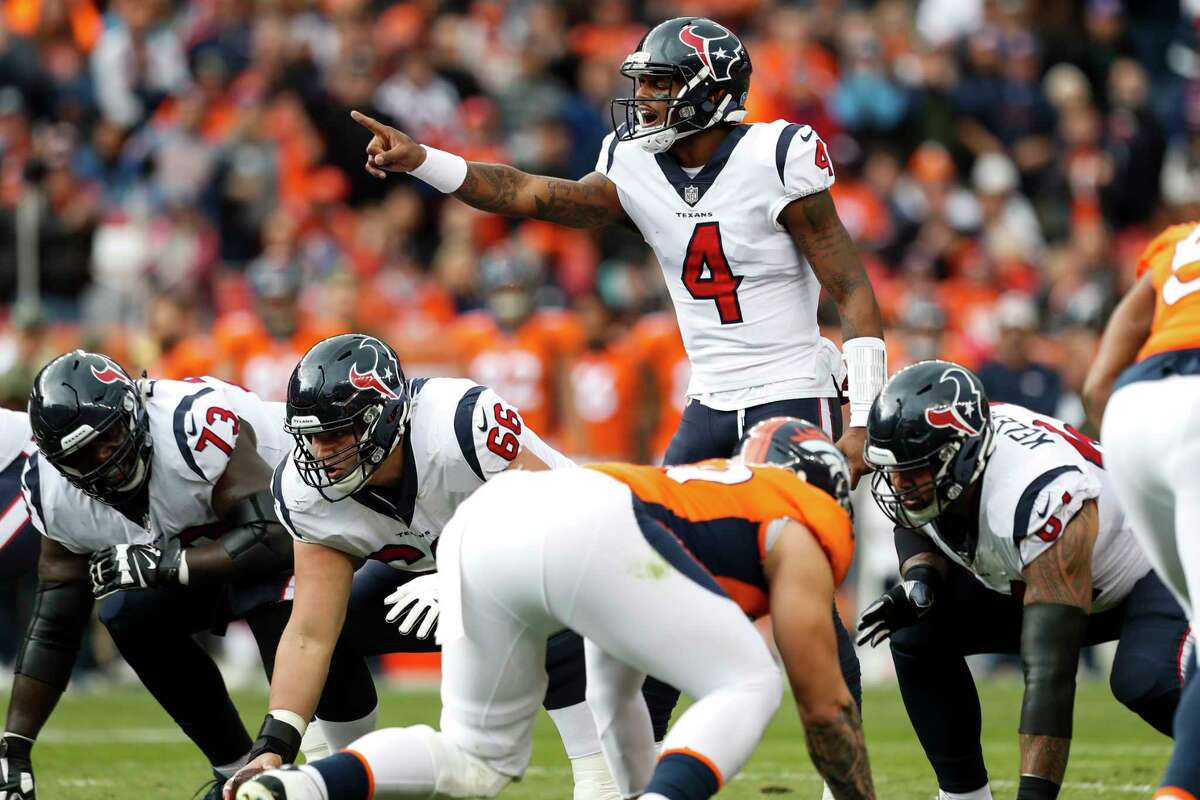 Houston Texans quarterback Deshaun Watson (4) calls signals at the line against the Denver Broncos during the second quarter of an NFL football game at Broncos Stadium at Mile High on Sunday, Nov. 4, 2018, in Denver.