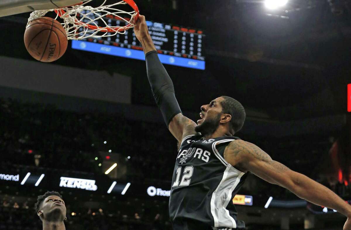 Tim Duncan not with Spurs in Orlando; focusing on Aldridge