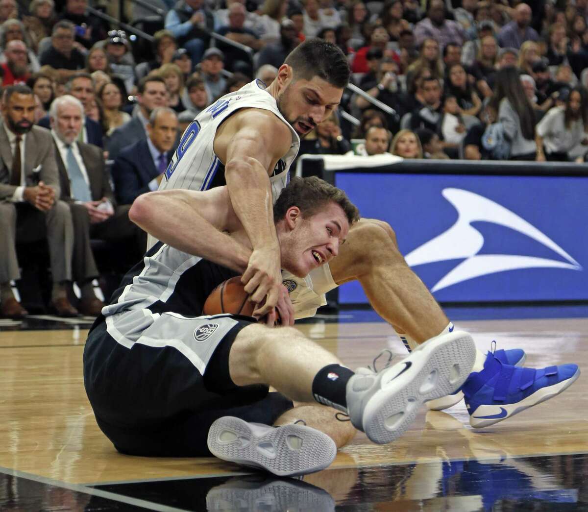 Nikola Vucevic #9 of the Orlando Magic tries to tie up Jakob Poeltl #25 of the San Antonio Spurs. Orlando Magic v San Antonio Spurs on Sunday, November 4, 2018 at AT&T Center.