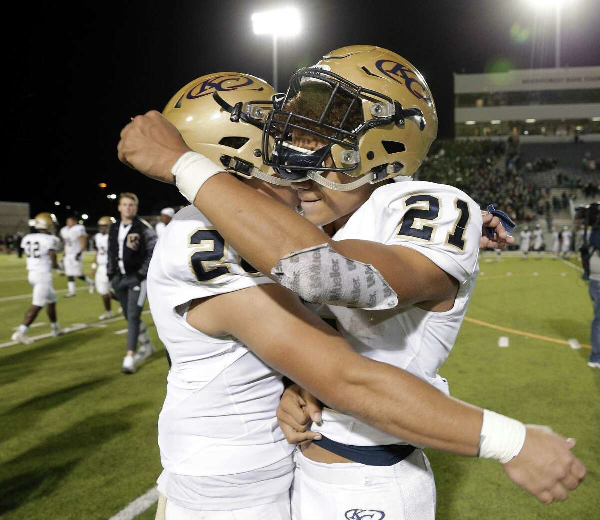 Klein Collins' John Madison (26) and Braelon Bridges (21) celebrate their 21-17 win over The Woodlands after the second half of their game Friday, Nov. 2, 2018 at Woodforest Bank Stadium in The Woodlands, TX.