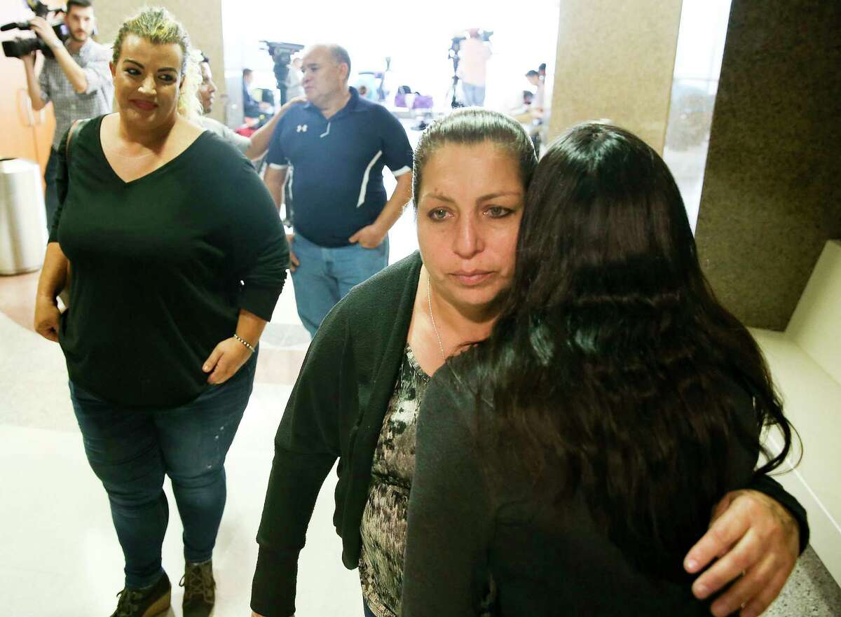 John Hernandez's mom, Maria Elena, walks away after talking to the media following the guilty verdict for Terry Thompson for the murder of her son at the Civil Courthouse in Houston on Monday, Nov. 5, 2018. Thompson was found guilty of murder of John Hernandez after choking him outside a Denny's in Crosby.