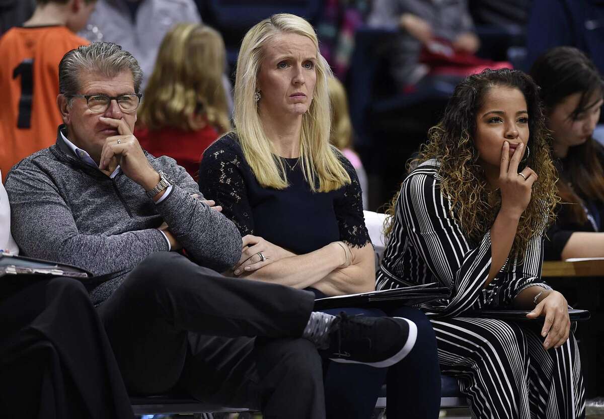 UConn coach Geno Auriemma watches play with assistants Shea Ralph and Jasmine Lister during the second half of a victory over Vanguard Sunday. (AP Photo/Jessica Hill)