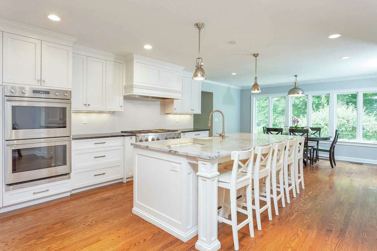 Darien colonial perfect for entertaining with pool, pond, patio